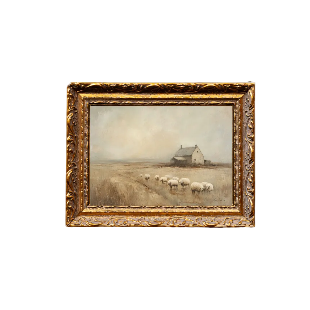 Framed painting of a pastoral scene with sheep and a house on a field.