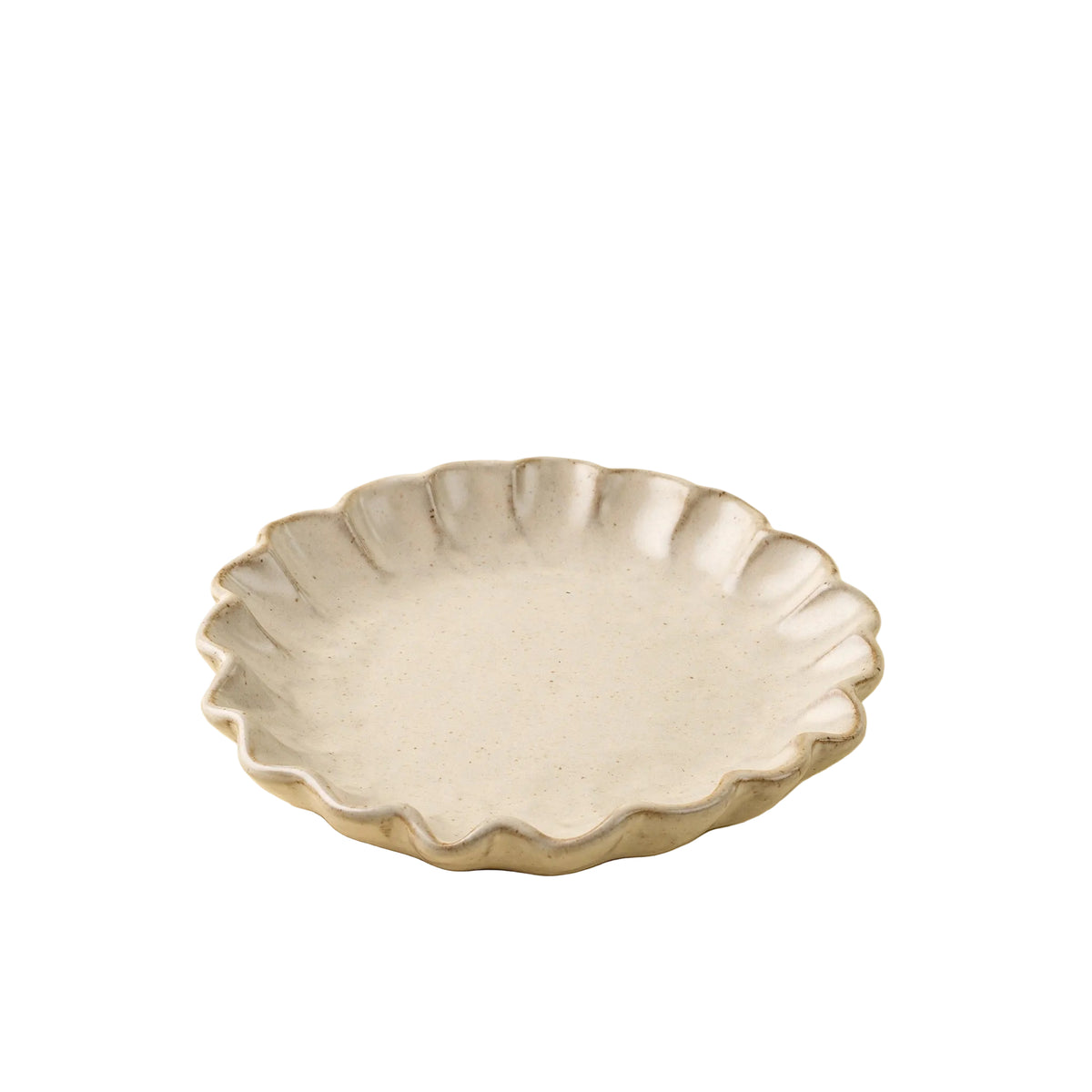 A small round ceramic plate with a scalloped, flower-like rim in a matte light gray glaze, set against a solid cream-colored background.