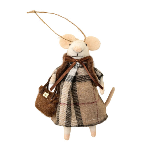 Stuffed mouse toy dressed in a plaid outfit with a bow and bag on a beige background