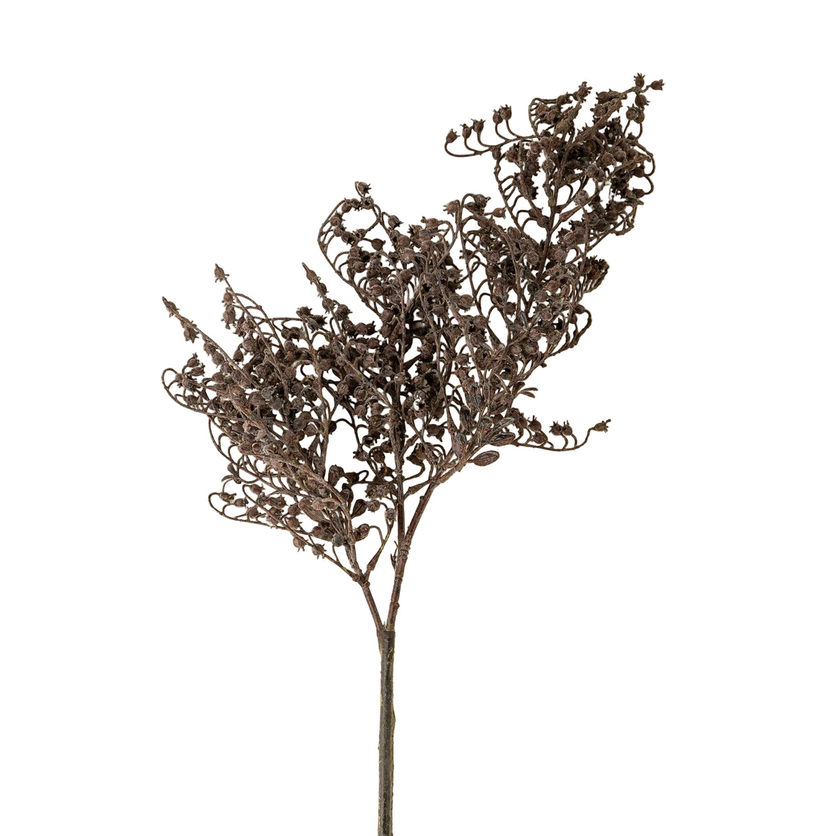 Decorative metal branch with leaf-like patterns on a beige background